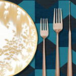 Dinnerware in shades of gold creates a festive feel with understated elegance