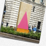 An outdoor painting display along New York City's Park Avenue depicts a purer place