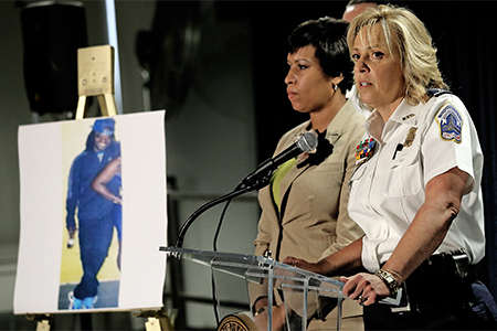 Mayor Muriel Bowser (left) and Chief of Police Cathy Lanier at a press conference about suspect Daron Wint