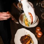 Saks and its VP of Client Engagement, Mariel Sholem, hosted a dinner at 4 Charles Prime Rib in New York City to celebrate the expansion of its luxury brand ambassador program, Saks Social Club