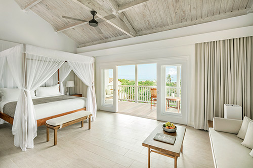 An ocean-facing room at COMO Parrot Cay