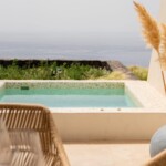 An all suite luxurious haven in Oia, carved into the cliffs of an old stone mine with direct views to Santorini's majestic sunset