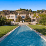 Beverly Hills’ most extravagant estate, Palazzo di Amore, is back on the market for $195 million, listed by luxury agent Erwin Nicholas (@mrrealestate). Recently thrust into the spotlight after Kai Cenat streamed from the property with guests like Kim Kardashian, LeBron James, and Snoop Dogg, the 25-acre “Palace of Love” features a 6-acre vineyard, 24-car garage, 50-seat theater, bowling alley, and 150-person infinity pool — solidifying its place as one of America’s most iconic and talked-about homes.