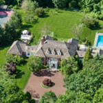 This Greenwich mansion has every amenity imaginable, including a heated pool, tennis court, observatory, hockey rink, green house and more