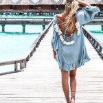 From caftans to mini dresses, shop our favorite beach styles