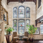 This one-of-a-kind Tudor revival property was built by famed architects Schwartz and Gross and boasts 14 handcrafted stained glass windows