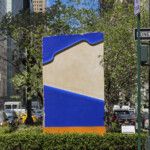 An outdoor painting display along New York City's Park Avenue depicts a purer place